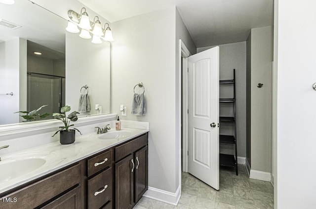 bathroom with vanity and an enclosed shower