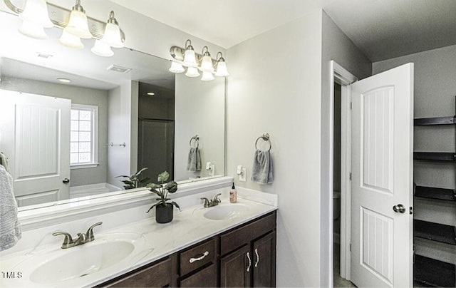 bathroom featuring vanity