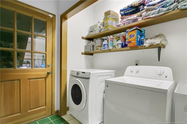 laundry room featuring sink and washer and clothes dryer