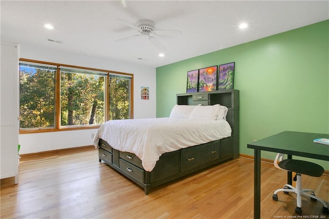 bedroom featuring ceiling fan and light wood-type flooring