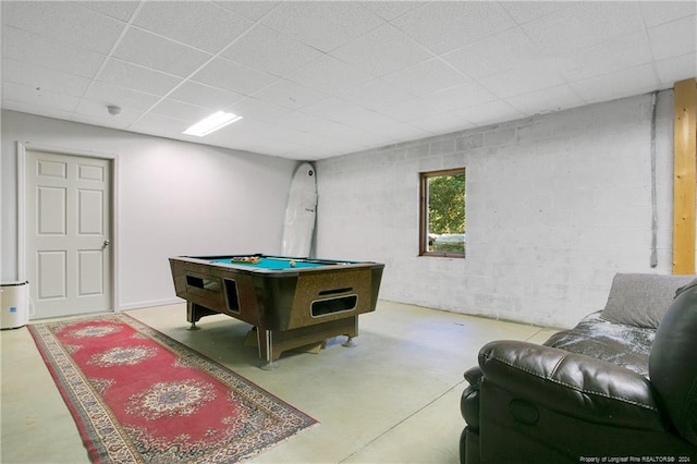 recreation room featuring concrete flooring and pool table