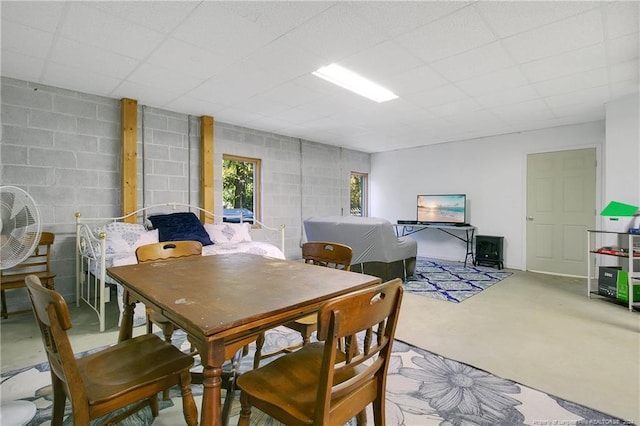 dining area with concrete floors