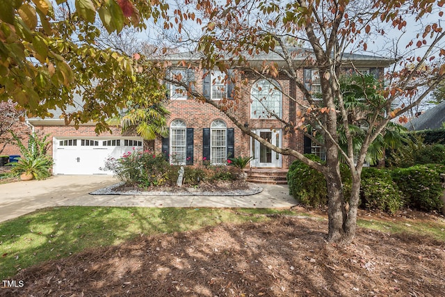 colonial home featuring a garage