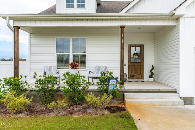 doorway to property featuring covered porch