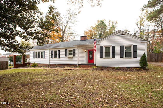 single story home with a front yard