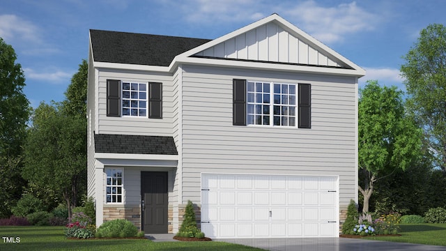 view of front facade with a garage and a front lawn