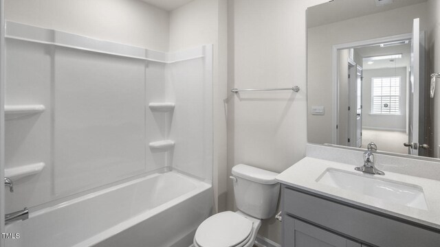 full bathroom featuring vanity, toilet, and shower / bathing tub combination