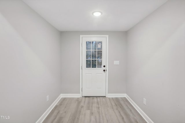 entryway with light hardwood / wood-style flooring