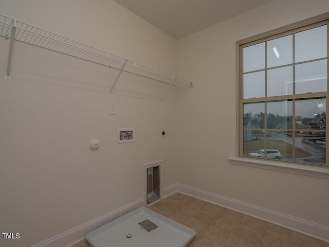 laundry area with gas dryer hookup, washer hookup, and hookup for an electric dryer