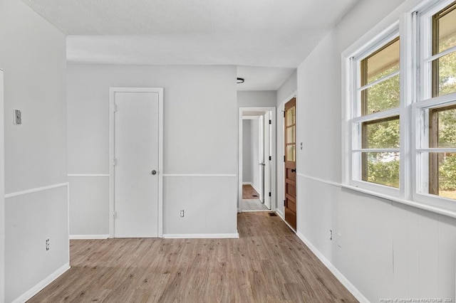 unfurnished bedroom featuring light hardwood / wood-style floors