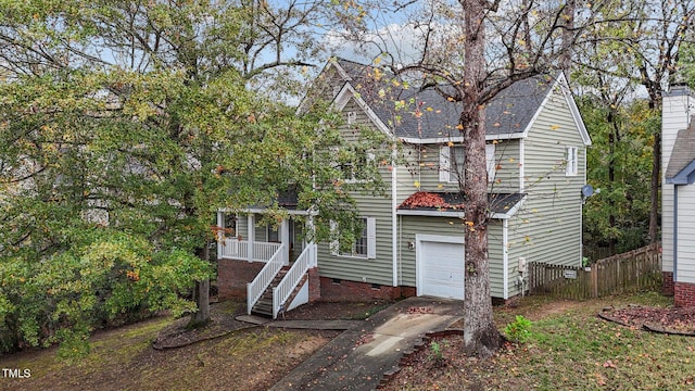 view of front of home with a garage