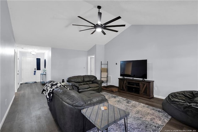 living room featuring dark wood-type flooring, ceiling fan, and vaulted ceiling