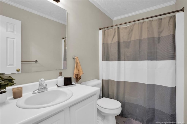 bathroom with ornamental molding, a shower with curtain, vanity, a textured ceiling, and toilet