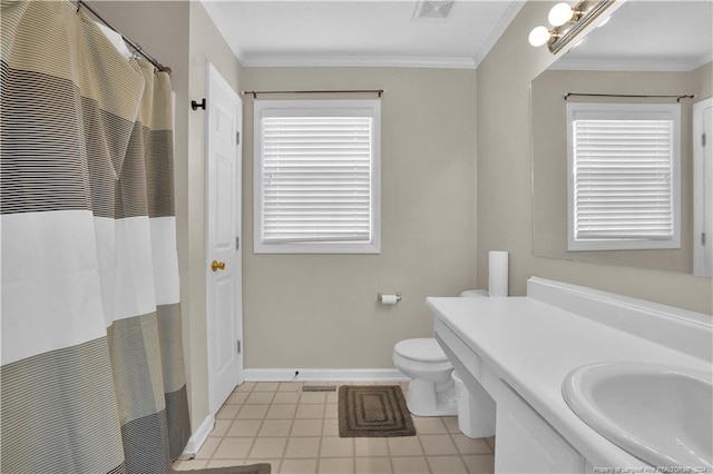 bathroom featuring toilet, vanity, and crown molding