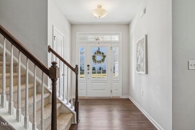 entrance foyer featuring dark hardwood / wood-style floors