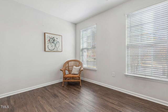 unfurnished room with dark hardwood / wood-style floors