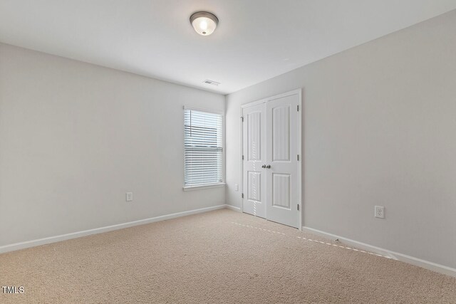 empty room featuring carpet