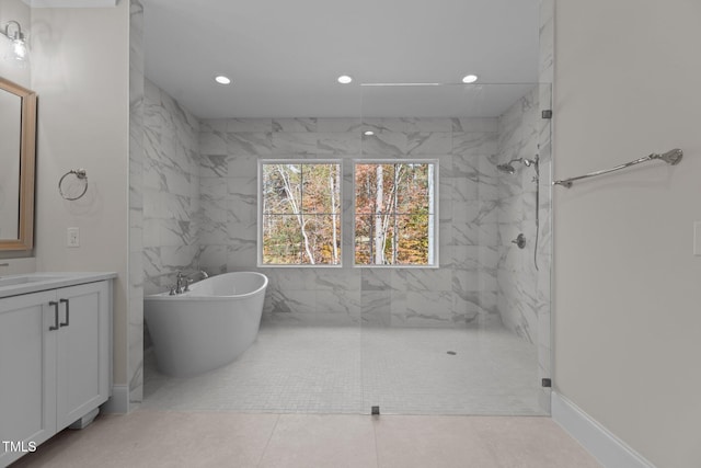 2105 Gentry Rd, Wake Forest, NC 27587 - full bathroom featuring a marble finish shower, a freestanding bath, recessed lighting, and vanity