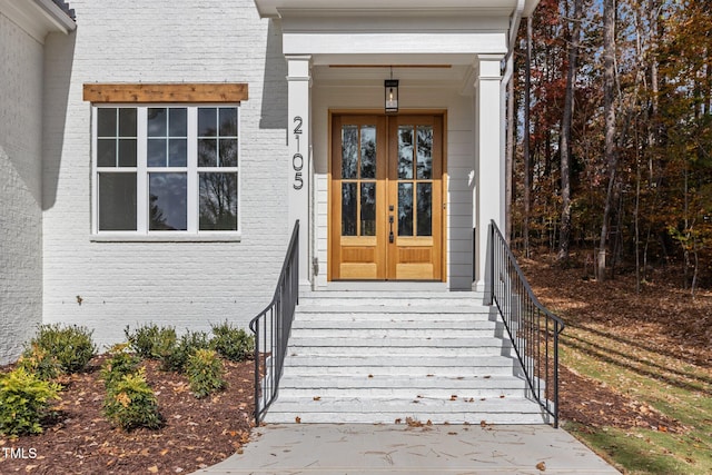 doorway to property with french doors