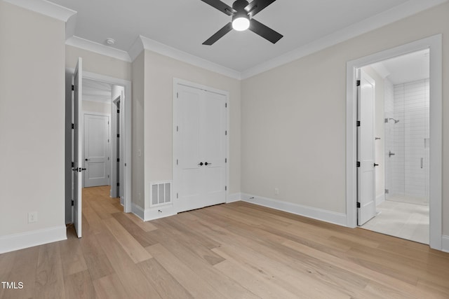 unfurnished bedroom with light wood-type flooring, ceiling fan, ornamental molding, and ensuite bathroom