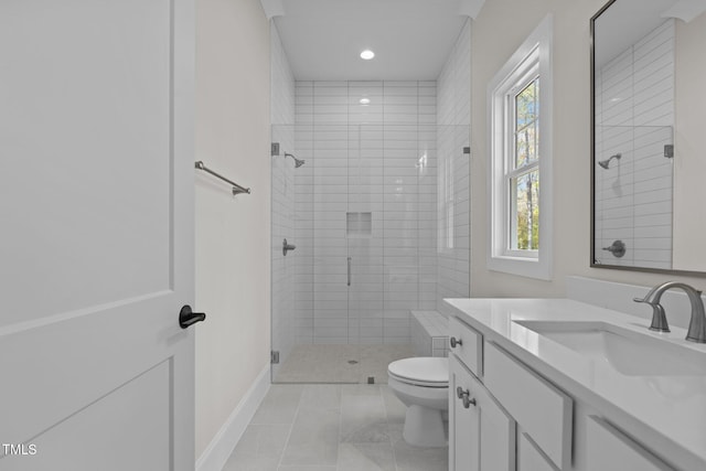 2105 Gentry Rd, Wake Forest, NC 27587 - bathroom featuring toilet, a stall shower, vanity, baseboards, and recessed lighting
