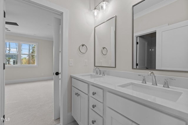 bathroom featuring vanity and crown molding