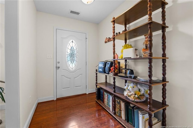 foyer with dark wood-type flooring