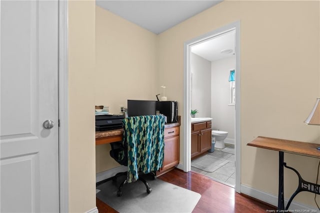 office area with dark wood-type flooring