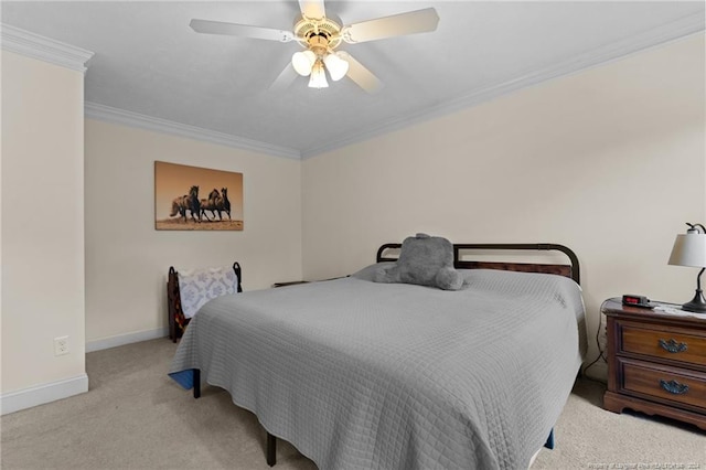 bedroom featuring light carpet, ceiling fan, and crown molding