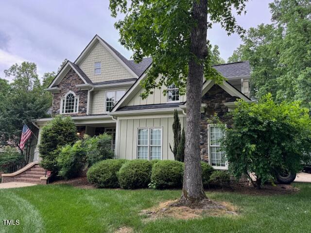 2012 Silverleaf Dr, Youngsville, NC 27596 - craftsman inspired home with board and batten siding and a front yard
