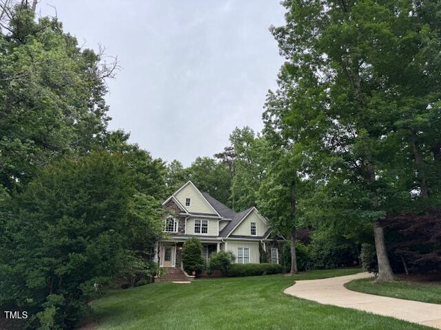 2012 Silverleaf Dr, Youngsville, NC 27596 - view of front of home featuring a front lawn