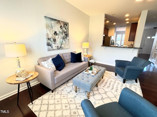 living room with hardwood / wood-style flooring