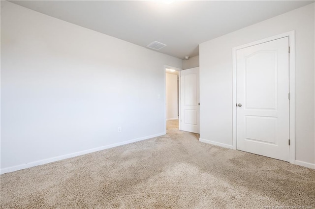 5918 Lowgrass Rd, Stedman, NC 28391 - unfurnished bedroom featuring light carpet and baseboards