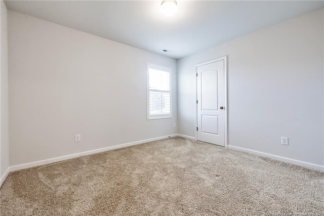 view of carpeted spare room