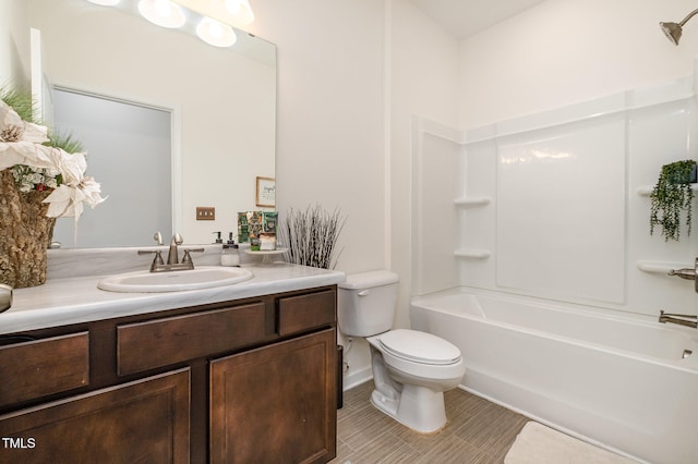 full bathroom featuring vanity, toilet, and shower / bathtub combination