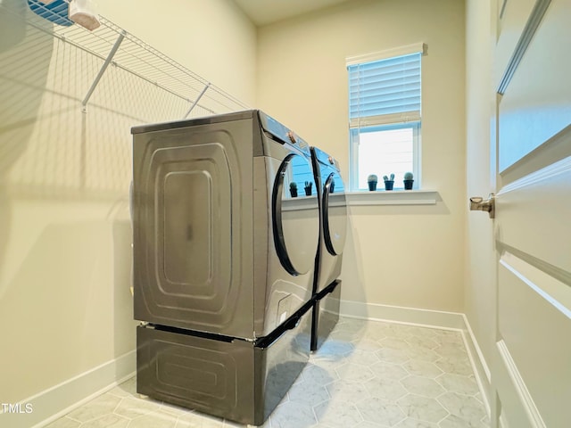 laundry area featuring washer and clothes dryer