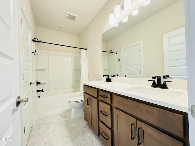 full bathroom featuring vanity, toilet, and shower / tub combo