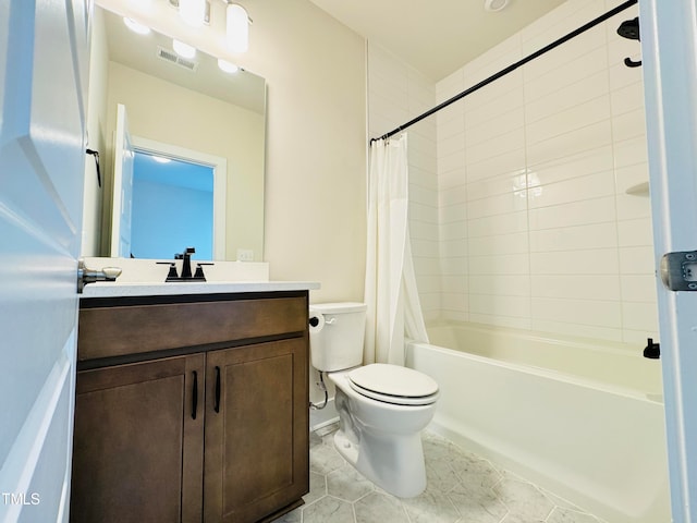 full bathroom featuring tile patterned flooring, vanity, toilet, and shower / tub combo with curtain