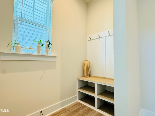 mudroom with hardwood / wood-style floors