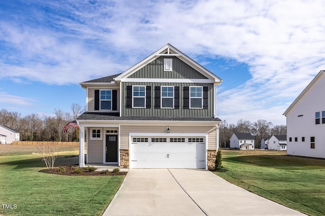 craftsman-style house featuring a garage and a front yard