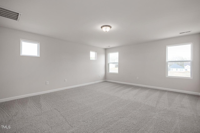 empty room featuring carpet flooring