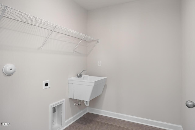 clothes washing area featuring electric dryer hookup