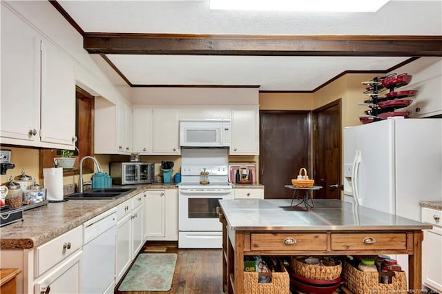 kitchen with stainless steel counters, white cabinetry, sink, dark hardwood / wood-style flooring, and white appliances