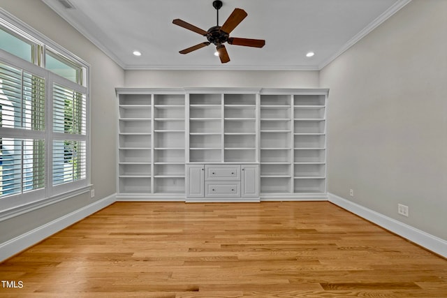 unfurnished bedroom with light hardwood / wood-style flooring, ceiling fan, and crown molding