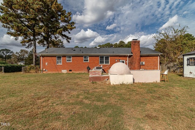 1717 Martin Luther King Dr, Rocky Mount, NC 27801 - rear view of property featuring crawl space, brick siding, and a chimney