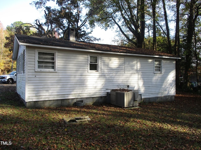 view of home's exterior with central air condition unit