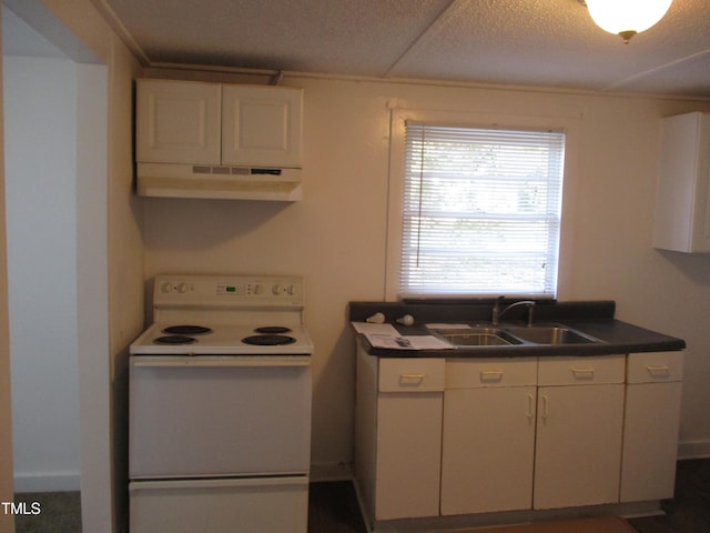 kitchen featuring white electric range oven, white cabinets, and sink