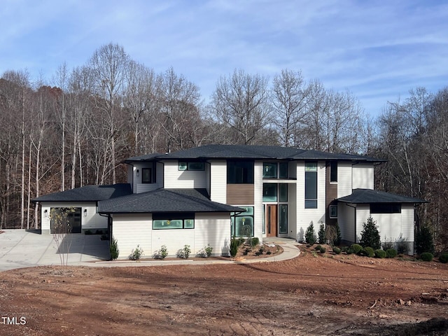 prairie-style house featuring a carport