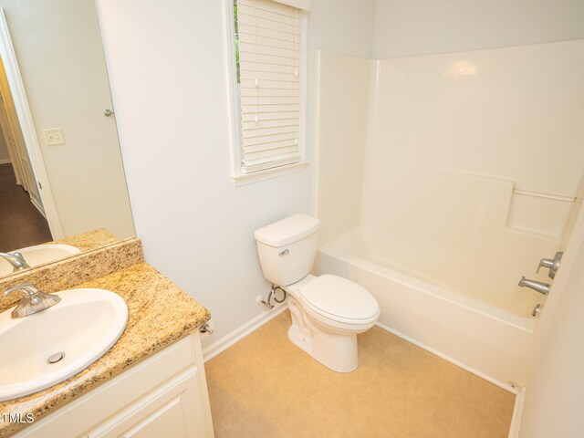 full bathroom featuring shower / bathing tub combination, vanity, and toilet