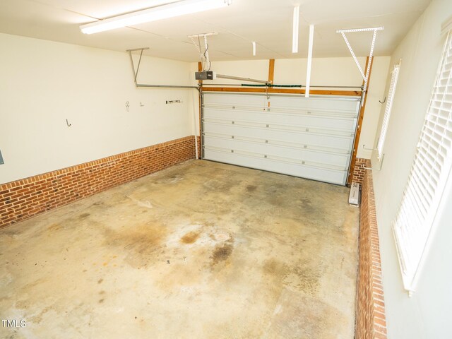6220 Sweden Dr, Raleigh, NC 27612 - garage featuring a garage door opener
